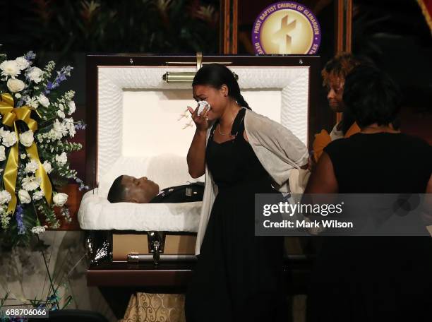 Mourners pay their respect during a funeral service for 2nd Lt. Richard Collins III, on May 26, 2017 in Upper Marlboro, Maryland. Collins was a Bowie...