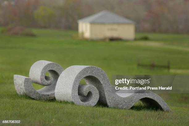 Fiddlehead chaise and Chaising Waves by Jordan Smith, granite, part of the Power of Place exhibit at Laudholm Farm in Wells, photographed on...