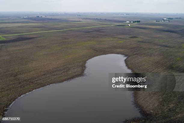 Standing water sits on top of a flooded agricultural field in this aerial photograph taken above Earlville, Illinois, U.S., on Thursday May 25, 2017....