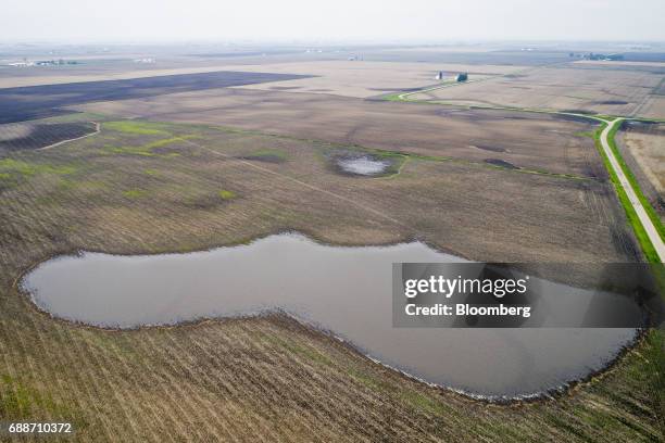 Standing water sits on top of a flooded agricultural field in this aerial photograph taken above Earlville, Illinois, U.S., on Thursday May 25, 2017....