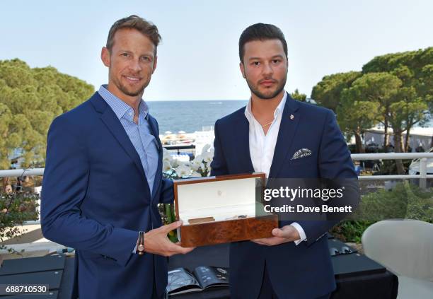 World Champion Jenson Button and Parham Ramezani pose at the launch of The Legacy Collection by Parham Ramezani on The Terrace, Amber Lounge at Le...