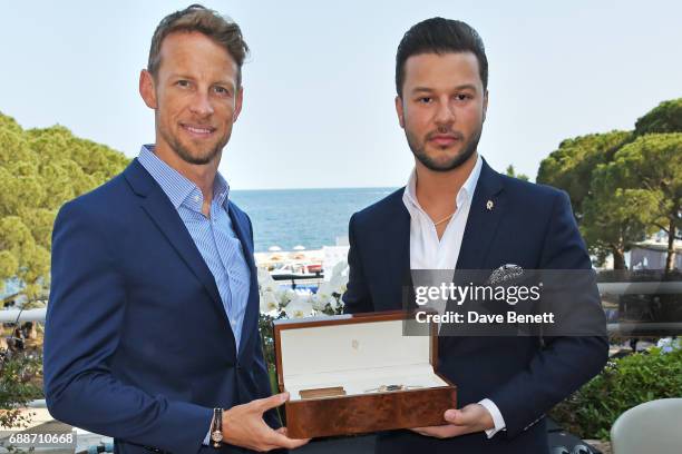 World Champion Jenson Button and Parham Ramezani pose at the launch of The Legacy Collection by Parham Ramezani on The Terrace, Amber Lounge at Le...