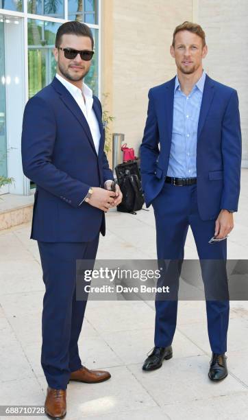 Parham Ramezani and 2009 F1 World Champion Jenson Button pose at the launch of The Legacy Collection by Parham Ramezani on The Terrace, Amber Lounge...