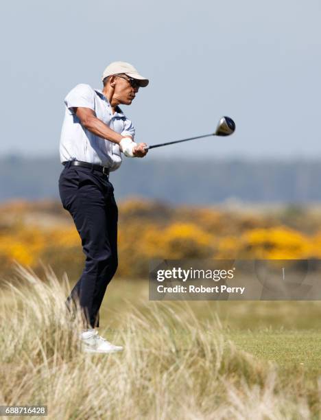 Former United States President Barack Obama plays a round of golf at the Old Course on May 26, 2017 in St Andrews, Scotland.