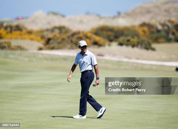 Former United States President Barack Obama plays a round of golf at the Old Course on May 26, 2017 in St Andrews, Scotland.