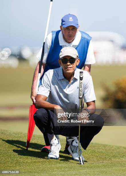 Former United States President Barack Obama plays a round of golf at the Old Course on May 26, 2017 in St Andrews, Scotland.