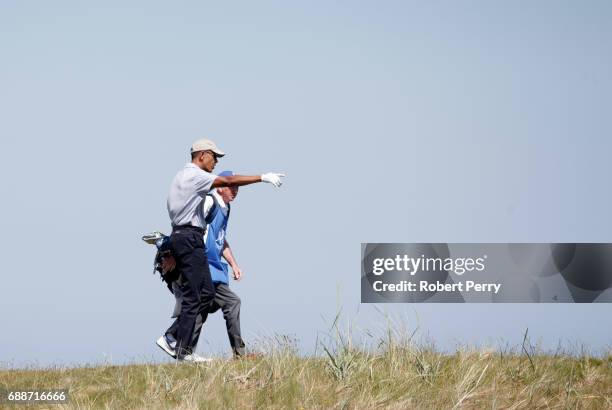 Former United States President Barack Obama plays a round of golf at the Old Course on May 26, 2017 in St Andrews, Scotland.