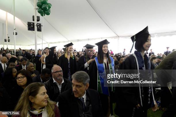 Students walk in the processional at commencement at Wellesley College May 26, 2017 in Wellesley, Massachusetts. Hillary Clinton, who graduated from...