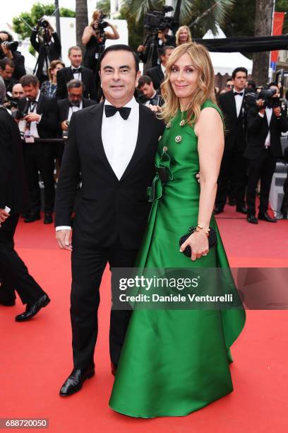 Renault CEO Carlos Ghosn and his wife Carole Ghosn attend "Amant Double " Red Carpet Arrivals during the 70th annual Cannes Film Festival at Palais...