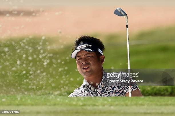 Yuta Ikeda of Japan plays a shot from a bunker on the fifth hole during Round Two of the DEAN & DELUCA Invitational at Colonial Country Club on May...