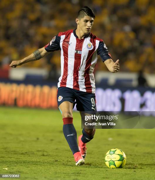 Alan Pulido of Chivas drives the ball during the Final first leg match between Tigres UANL and Chivas as part of the Torneo Clausura 2017 Liga MX at...