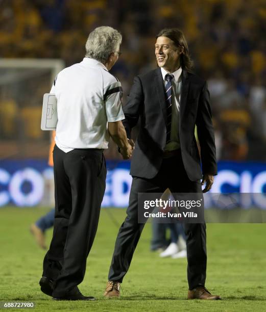 Matias Almeyda coach of Chivas greets Ricardo Ferretti coach of Tigres prior to the Final first leg match between Tigres UANL and Chivas as part of...