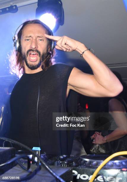 Bob Sinclar performs during the VIP Room Cannes Akon and Bob Sinclar Concert Party during the 70th annual Cannes Film Festival at on May 25, 2017 in...