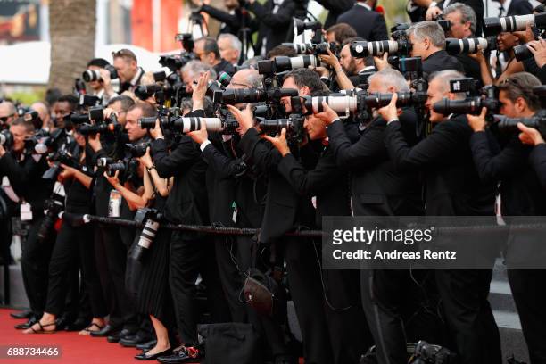 Photographers capture guests on the carpet at the "Amant Double " screening during the 70th annual Cannes Film Festival at Palais des Festivals on...