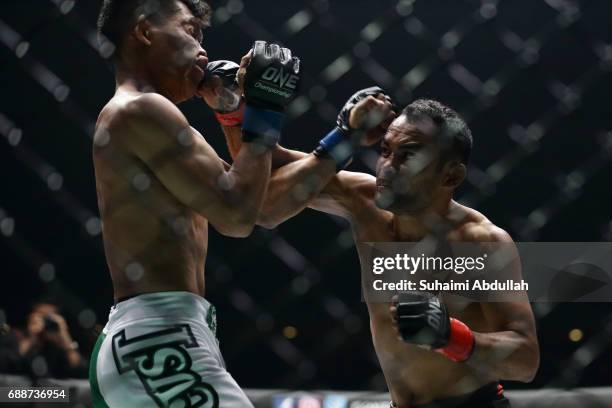 Dejdamrong Soe Amnuaysirichoke of Thailand fights Adrian Matheis of Indonesia in the straw weight bout during the One Championship Dynasty of Heroes...