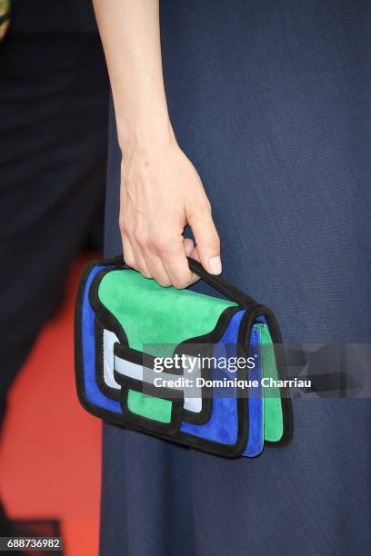 Amira Casar, purse detail, attends the "Amant Double " screening during the 70th annual Cannes Film Festival at Palais des Festivals on May 26, 2017...