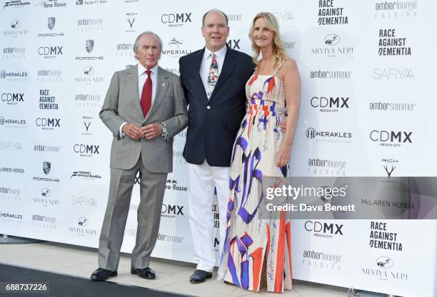 Sir Jackie Stewart, Albert II, Prince of Monaco, and Sonia Irvine attend the Amber Lounge Fashion Monaco 2017 at Le Meridien Beach Plaza Hotel on May...