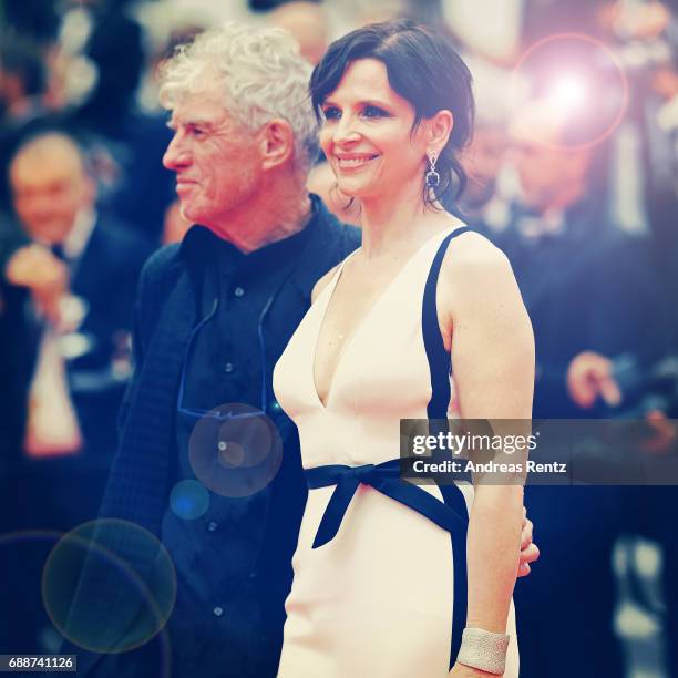 Juliette Binoche and director Christopher Doyle attend the 'Amant Double ' screening during the 70th annual Cannes Film Festival at Palais des...