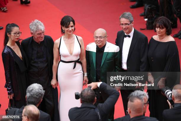 Rain Li, Christopher Doyle, Juliette Binoche and guests attend the "Amant Double " screening during the 70th annual Cannes Film Festival at Palais...
