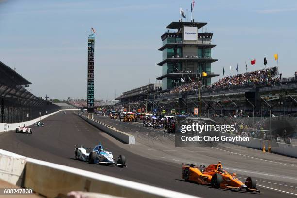 Fernando Alonso of Spain, driver of the Chandon Honda drives during Carb day for the 101st Indianapolis 500 at Indianapolis Motorspeedway on May 26,...