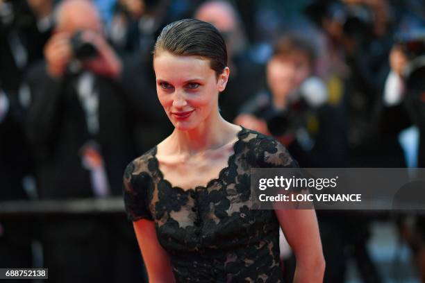 French actress Marine Vacth poses as she leaves the Festival Palace on May 26, 2017 following the screening of the film 'L'Amant Double' at the 70th...