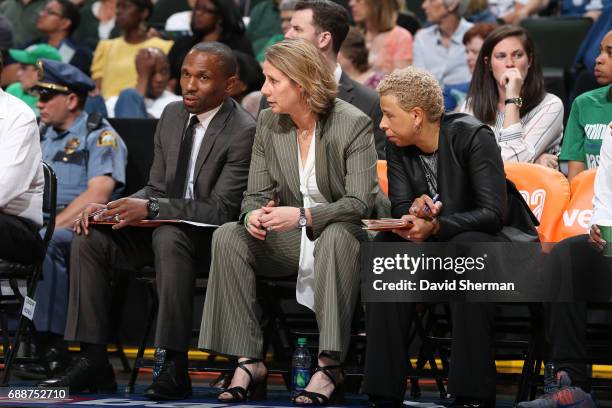 Cheryl Reeve, Shelley Patterson and James Wade of the Minnesota Lynx sit on the bench during the game against the Chicago Sky on May 14, 2017 at Xcel...