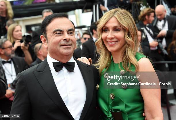 Renault CEO Carlos Ghosn and Carole Ghosn attend the "Amant Double " premiere during the 70th annual Cannes Film Festival at Palais des Festivals on...