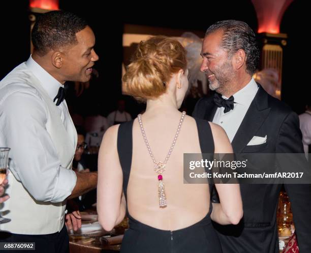 Will Smith, Jessica Chastain and Remo Ruffini attend the amfAR Gala Cannes 2017 at Hotel du Cap-Eden-Roc on May 25, 2017 in Cap d'Antibes, France.