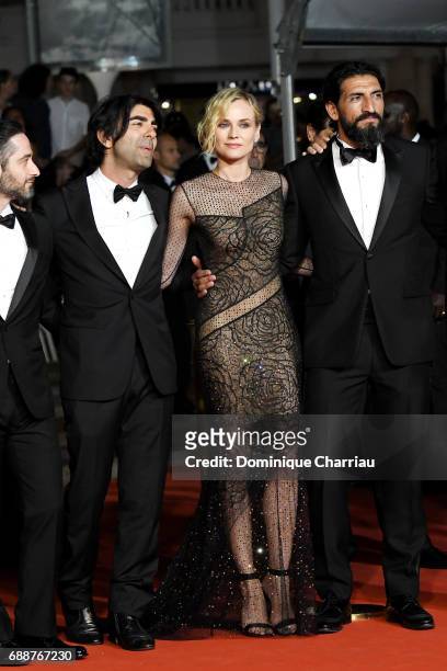 Denis Moschitto, director Fatih Akin, Diane Kruger and Numan Acar attends the "In The Fade " screening during the 70th annual Cannes Film Festival at...