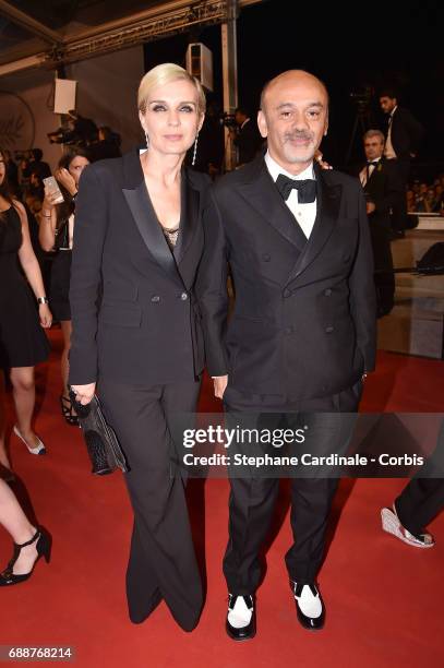 Melita Toscan du Plantier and Christian Louboutin attend the "In The Fade " screening during the 70th annual Cannes Film Festival at Palais des...