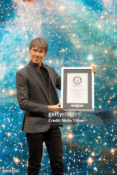 Professor Brian Cox with his award at his Guinness World Record breaking live tour show, Professor Brian Cox Live at SSE Arena Wembley on May 26,...