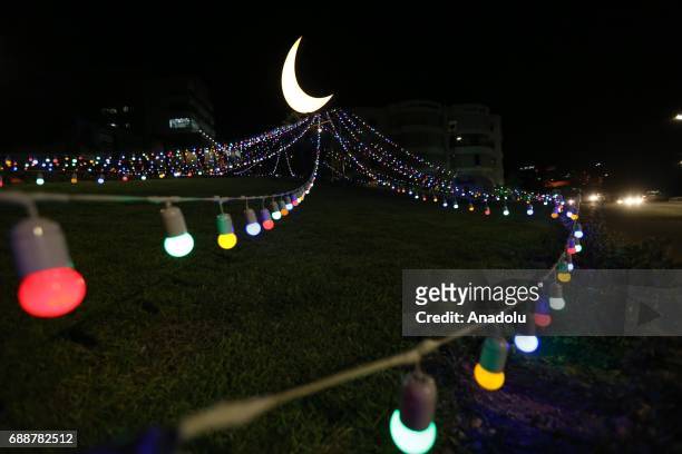 Illuminated decorations are seen during the first 'Tarawih' prayer on the eve of the Islamic holy month of Ramadan at Hind Hijazi Mosque in Sidon,...