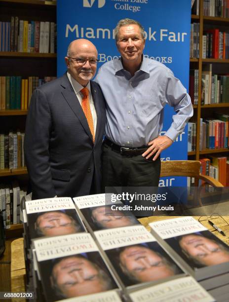 John Kasich , Governor of Ohio and a former U.S. Presidential candidate pose for picture with Eduardo J. Padrón, President, Miami Dade College during...