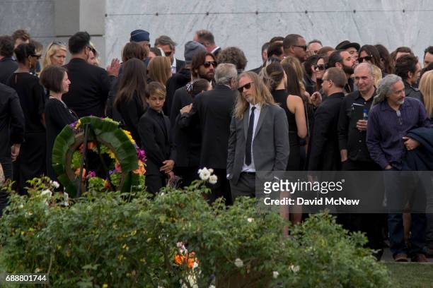 Musicians and loved ones stand graveside at funeral services for Soundgarden frontman Chris Cornell at Hollywood Forever Cemetery on May 26, 2017 in...