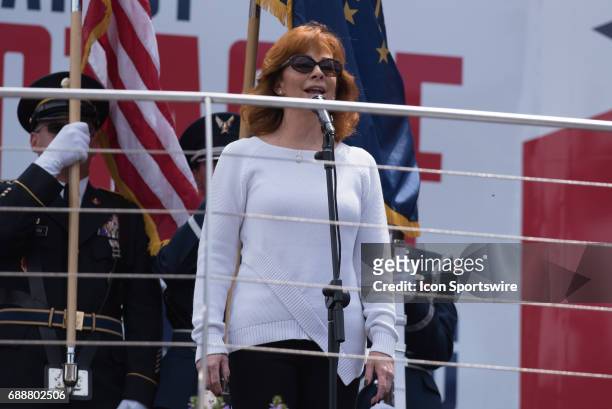 County music star Reba McEntire singing the national anthem for the Indy Lights Freedom 100 on Carb Day for the 101st Indianapolis on May 26 at the...