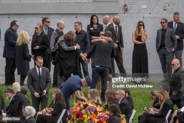 People attend funeral services for Soundgarden frontman Chris Cornell at Hollywood Forever Cemetery on May 26, 2017 in Hollywood, California. The...