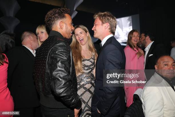 Formula1 driver Lewis Hamilton, Nico Rosberg and his wife Vivian Rosberg attend the amfAR Gala Cannes 2017 at Hotel du Cap-Eden-Roc on May 25, 2017...