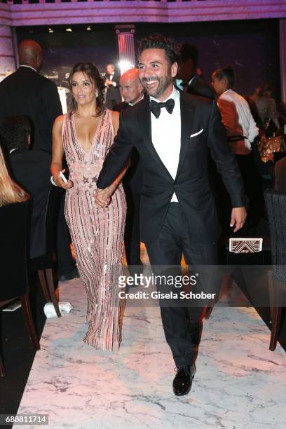 Eva Longoria and her husband Jose Baston attend the amfAR Gala Cannes 2017 at Hotel du Cap-Eden-Roc on May 25, 2017 in Cap d'Antibes, France.