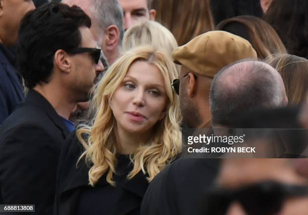 Courtney Love attends the funeral and memorial service for Soundgarden frontman Chris Cornell, May 26, 2017 at Hollywood Forever Cemetery in Los...