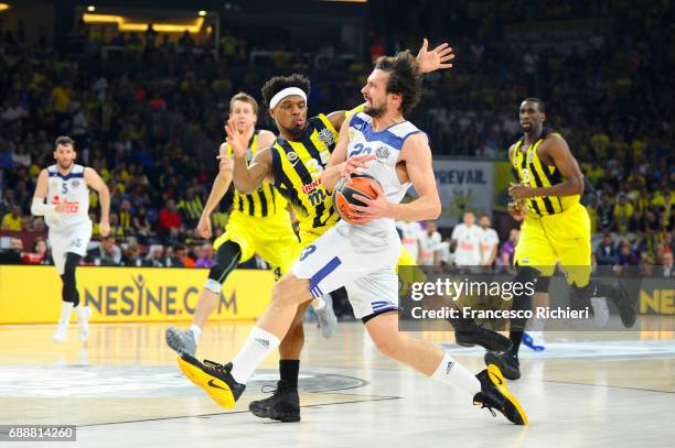 Sergio Llull, #23 of Real Madrid competes with Bobby Dixon, #35 of Fenerbahce Istanbul during the Turkish Airlines EuroLeague Final Four Semifinal A...