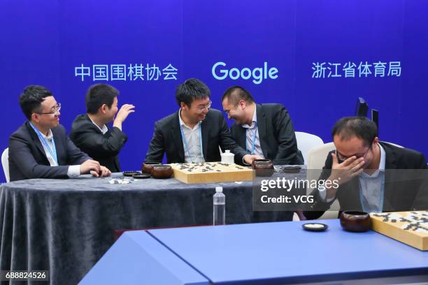 Five players - Shi Yue, Mi Yuting, Tang Weixing, Chen Yaoye and Zhou Ruiyang form a team to compete against AlphaGo during the Future of Go Summit at...