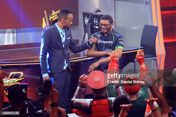 Victor 'Punk' Woodley, of the USA, is interviewed by Malik Forte, ELEAGUE reporter, after beating Arman 'Phenom' Hanjani in the Grand Final of the...