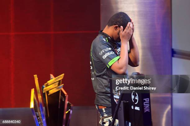 Victor 'Punk' Woodley, of the USA, celebrates beating Arman 'Phenom' Hanjani in the Grand Final of the ELEAGUE Street Fighter V Invitational Playoffs...
