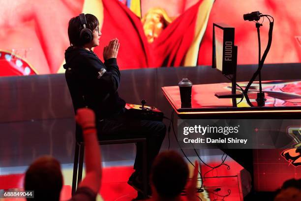 Ai 'Fuudo' Keita, of Japan, celebrates beating Eduardo 'PR Balrog' Perez, of Puerto Rico, during the ELEAGUE Street Fighter V Invitational Playoffs &...