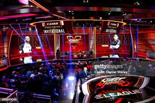 Victor 'Punk' Woodley, of the USA, plays against Arman 'Phenom' Hanjani, of Norway, in the semi-final of the ELEAGUE Street Fighter V Invitational...