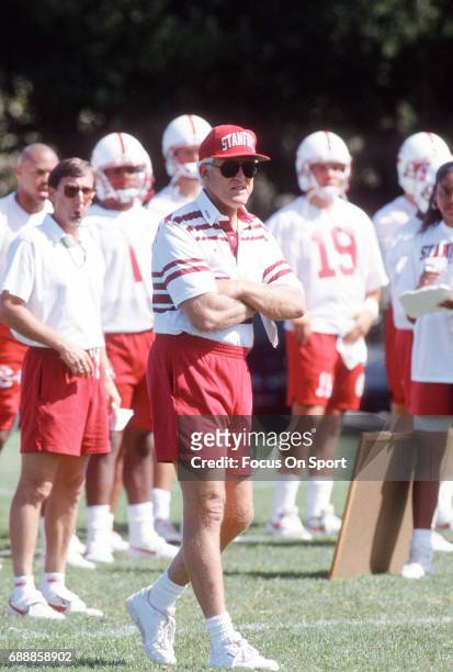 Head coach Bill Walsh of the Stanford Cardinal looks on during practice circa 1992 at Stanford University in Palo Alto, California.