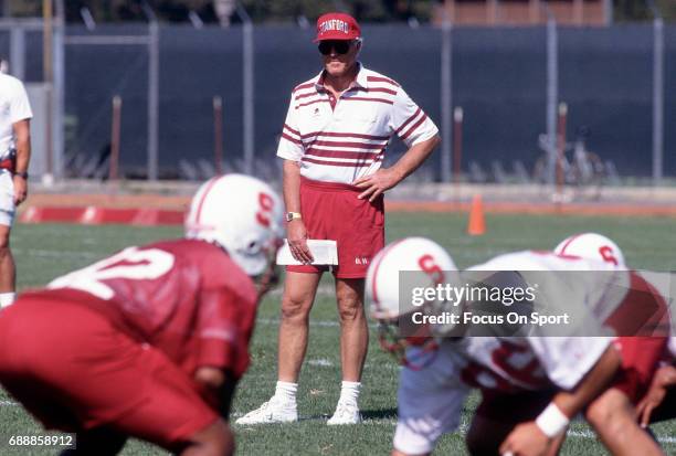 Head coach Bill Walsh of the Stanford Cardinal looks on during practice circa 1992 at Stanford University in Palo Alto, California.