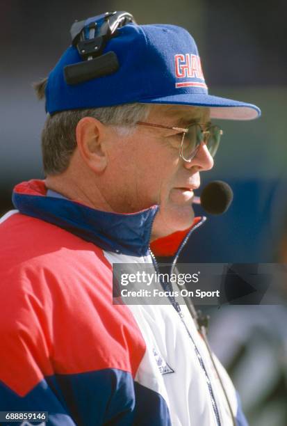 Head Coach Dan Reeves of the New York Giants looks on from the sidelines during an NFL football game circa 1994 at Giants Stadium in East Rutherford,...