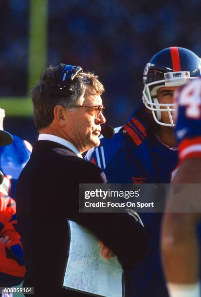 Head Coach Dan Reeves of the New York Giants looks on from the sidelines during an NFL football game circa 1995 at Giants Stadium in East Rutherford,...