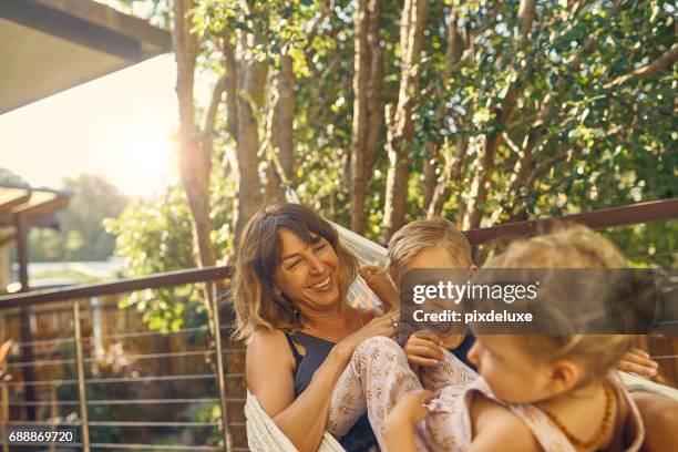 having a laugh - family happiness stock pictures, royalty-free photos & images